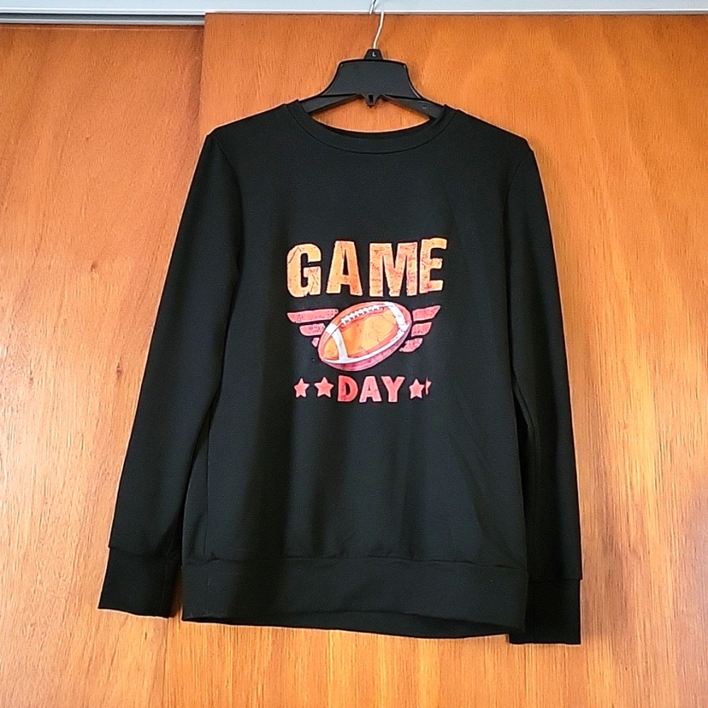 Brand new, never worn, game day, football sweatshirt in black, size L